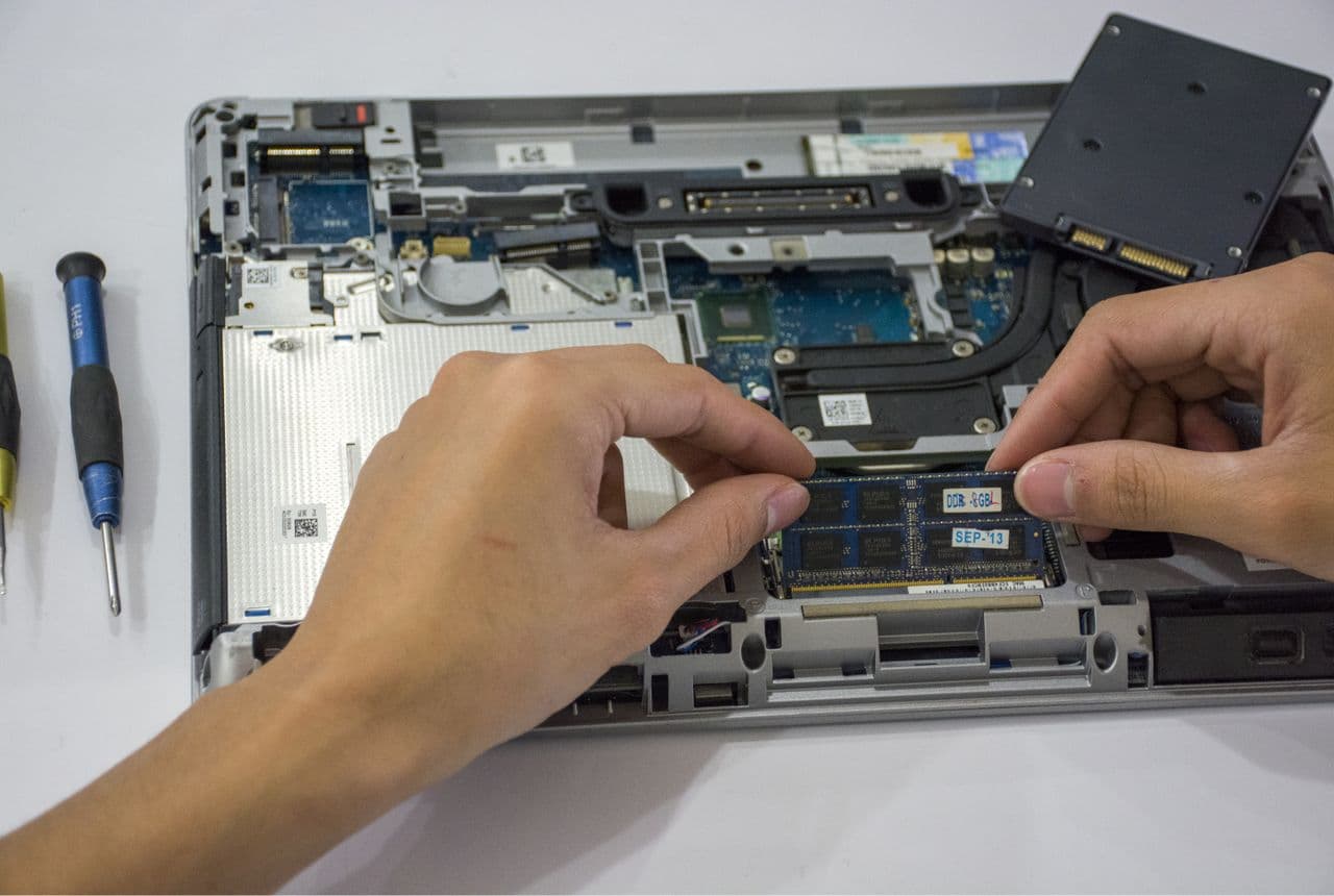 Laptop and MacBook repair on a professional workbench in Dubai