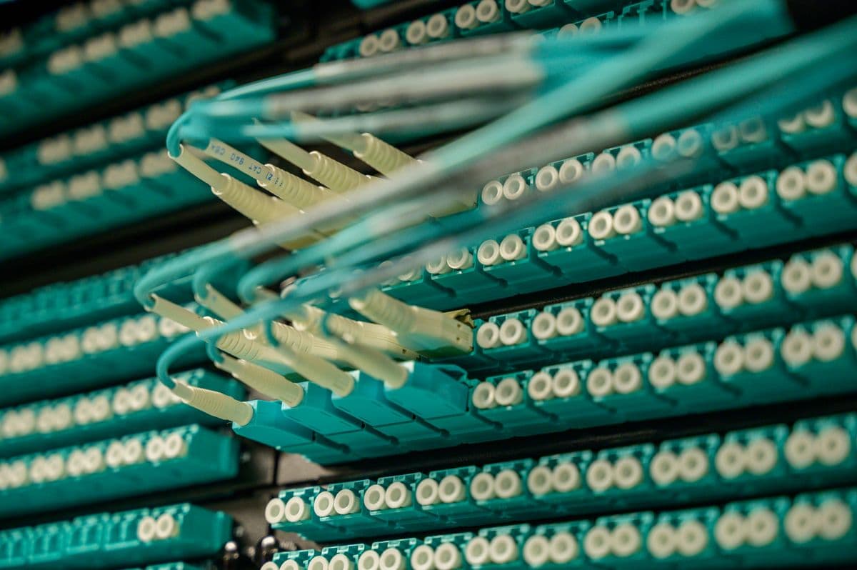 Fibre-optic connections on a network patch panel