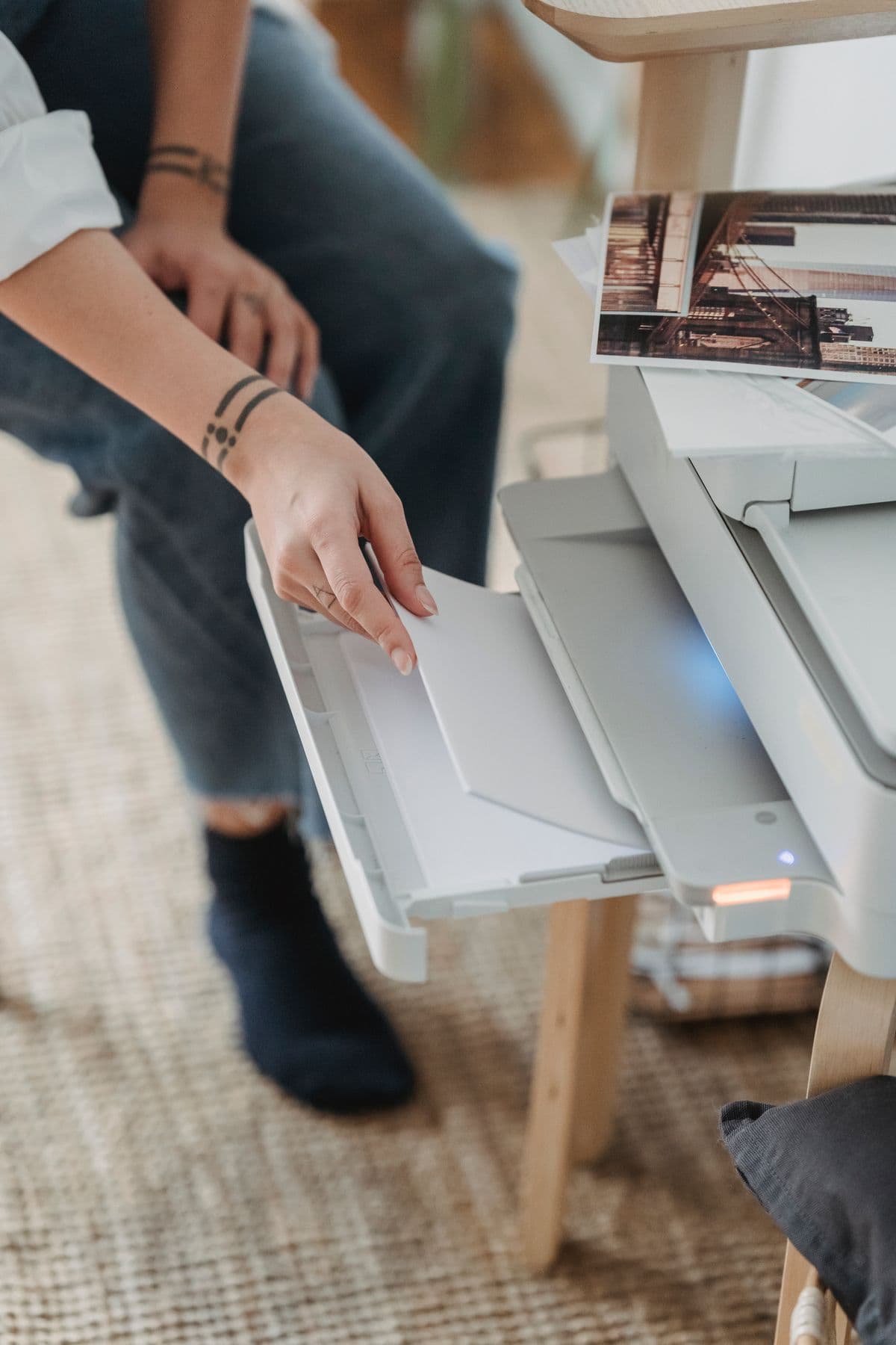 Loading paper into an office printer tray