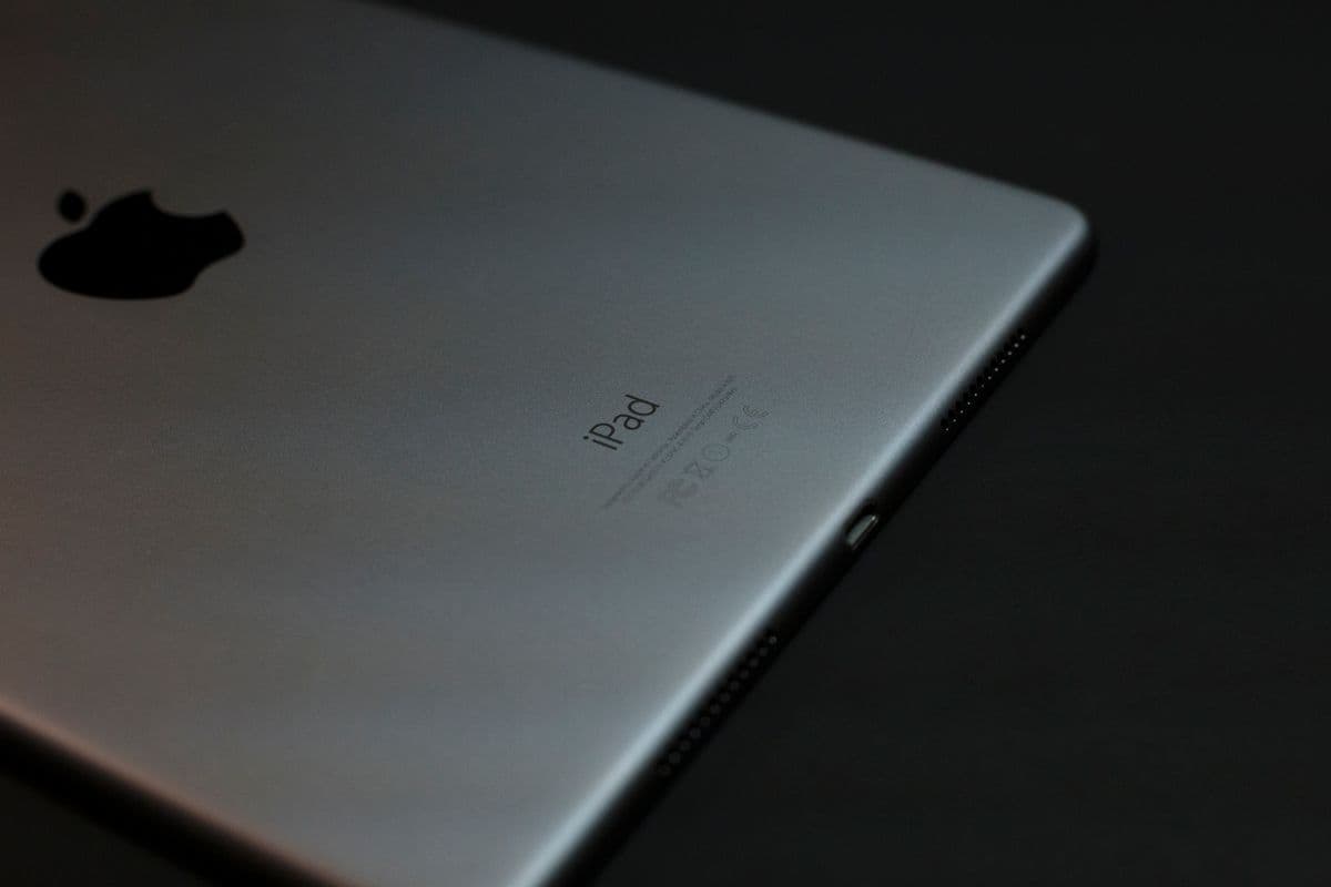 Close-up of an iPad showing the Apple logo